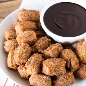 Gluten Free Vegan Churro Bites with Chocolate Sauce. Bite-size fried churros, dipped in a creamy chocolate sauce. You can’t dip just one!